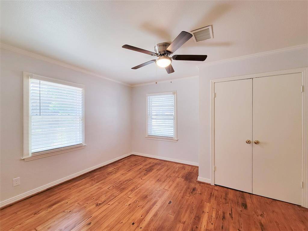 Bedroom 3- fresh paint, recent refinished hardwoods, new ceiling fan and 2 inch faux wood.