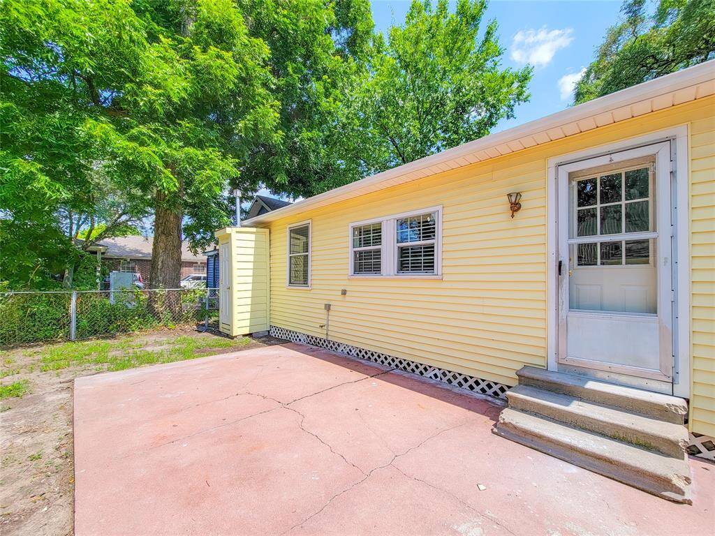 Exterior patio and larg fenced yard.