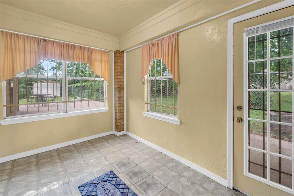 Enjoy year-round natural light in the spacious sunroom
