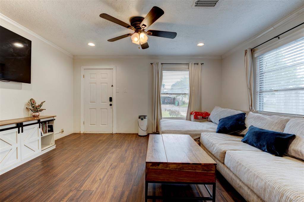 Expansive living area with updated flooring throughout