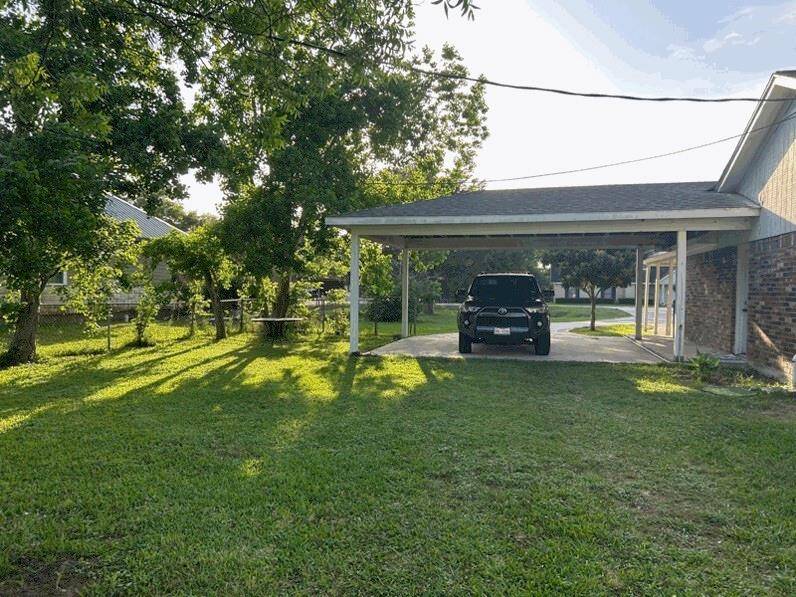Spacious carport offering 2 parking spaces.