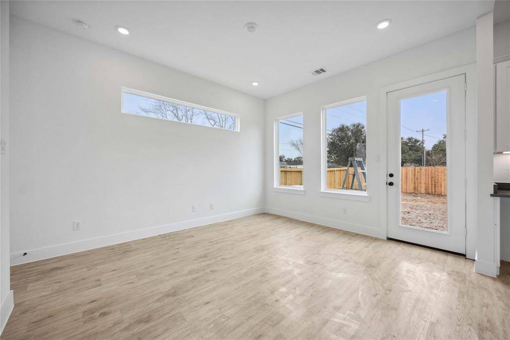 Recessed lights compliment the open first floor living space