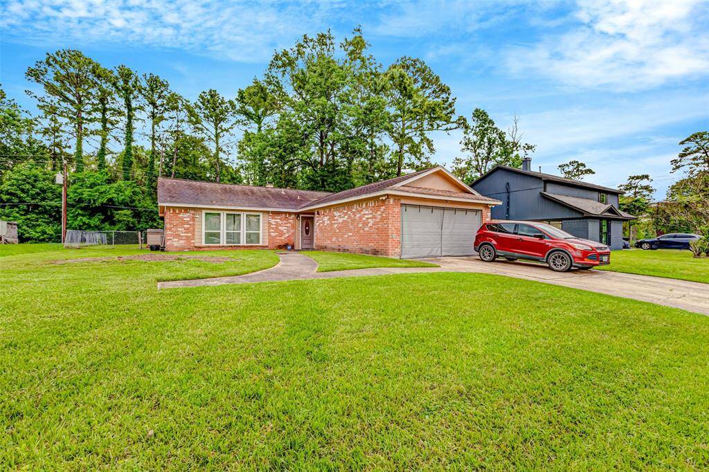Charming single-story brick home with a spacious lawn, nestled in a serene neighborhood. Enjoy the convenience of a two-car garage and easy access to nearby amenities.