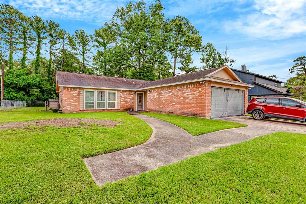 Charming brick home with a spacious front yard, nestled in a serene neighborhood. Enjoy the convenience of a two-car garage and a welcoming entrance. Perfect for those seeking comfort and privacy.