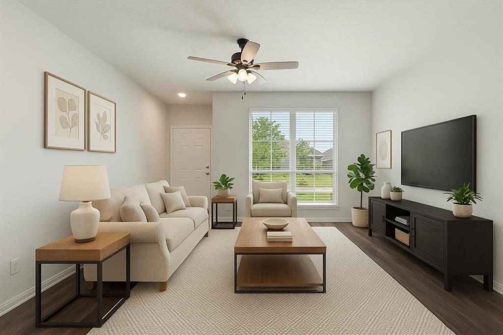 As you enter, you are greeted by gleaming engineered wood floors, and natural light that fills the entire home. This room is virtually staged.