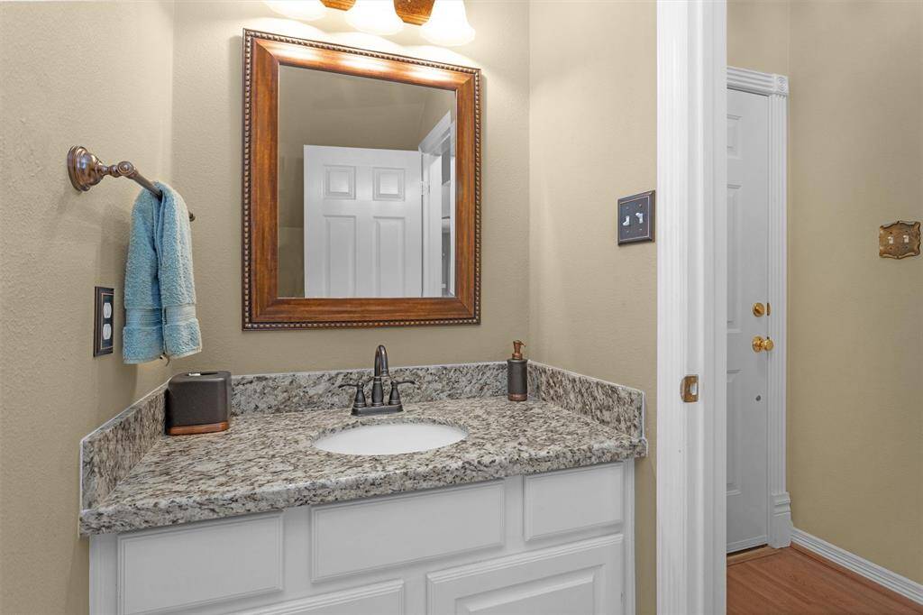 Guest half bathroom off the entry hall