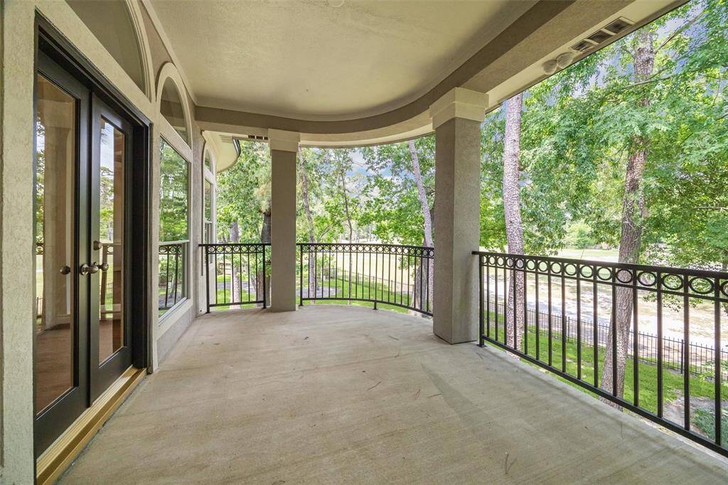Balcony accessible from the primary bedroom and living area.