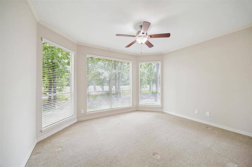 Bedroom located on the first floor features a Jack and Jill bathroom.