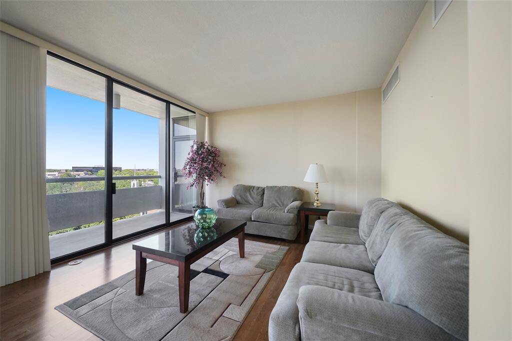 The living area features a spacious layout that easily accommodates everyday comfort and casual gatherings.
