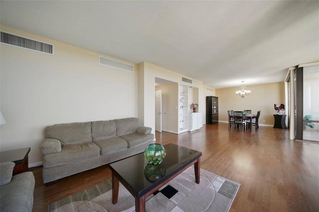 This open layout makes it easy to move between the living and dining areas, with plenty of room to relax, host, and make the space your own.