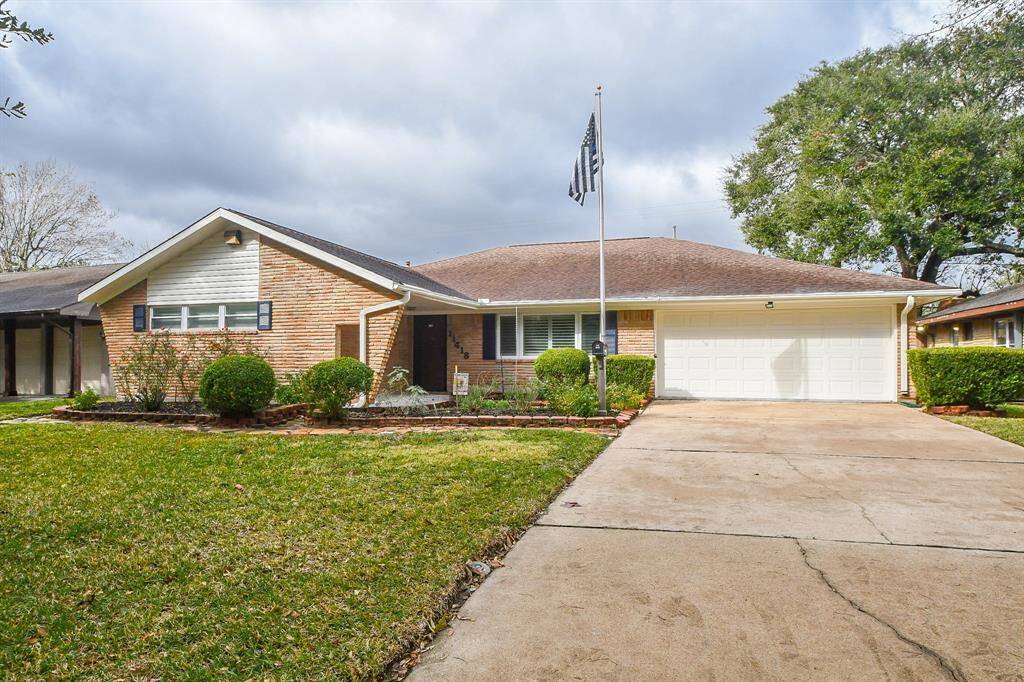 They don't make 'em like this anymore; with wide, easy to access driveway and clean attached garage.