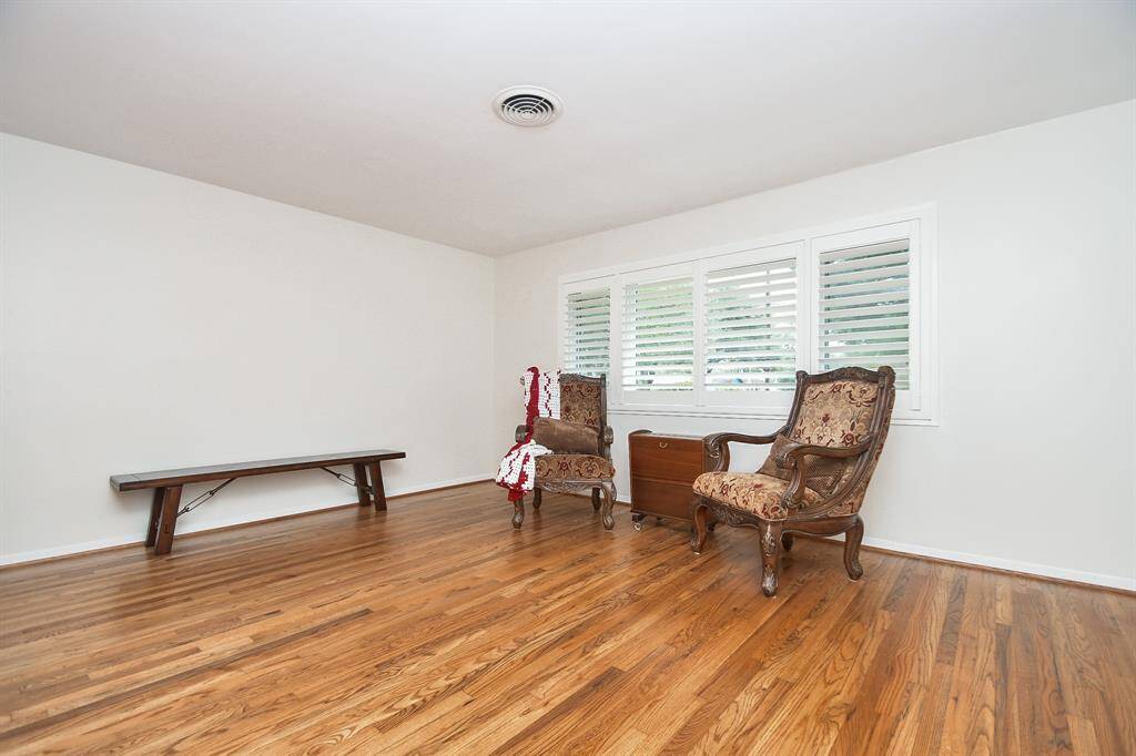 This amazing front room (with raised, shuttered windows for great natural light) can become anything that supports your lifestyle preferences.