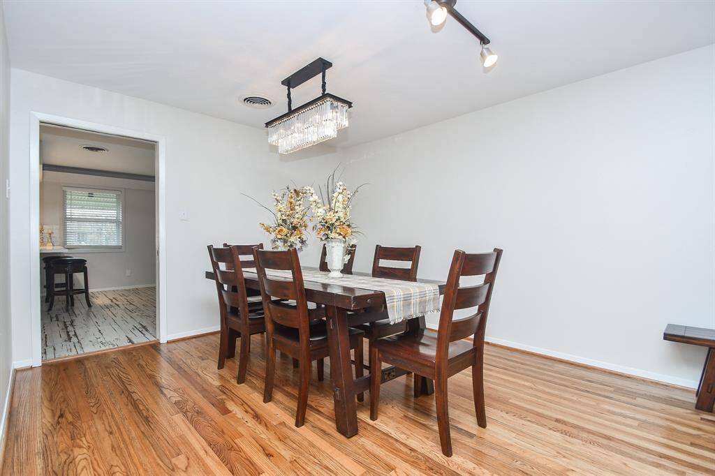 Feel free to fill this open space with sizeable dining pieces and favorite serving accents.
