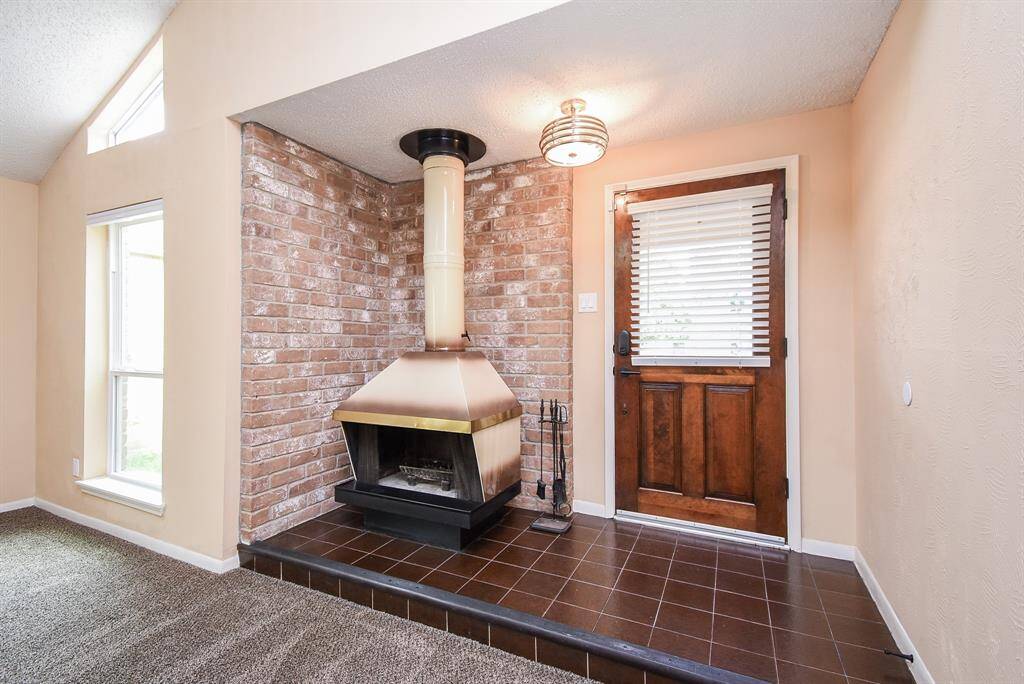 Wood burning stove in the family room.
