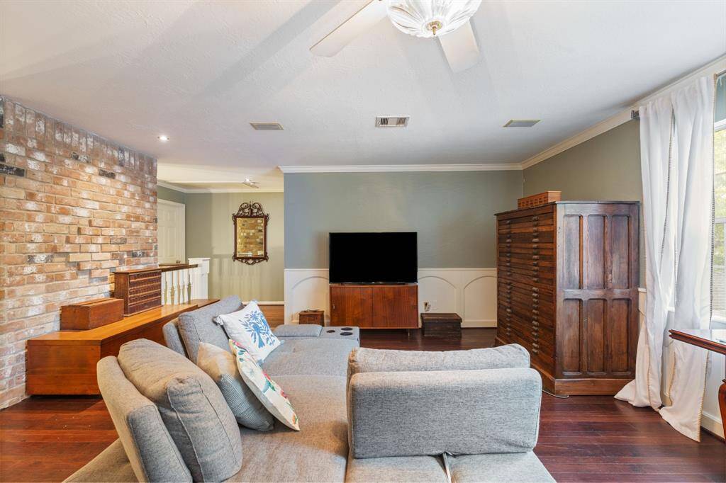 This large gameroom area is the perfect spot to relax and watch movies or to have kids' toys.
