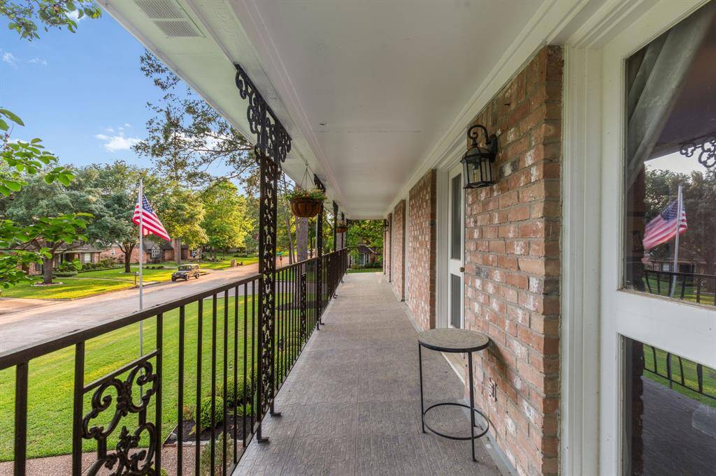 Stunning balcony that spans the width of the entire front of the house