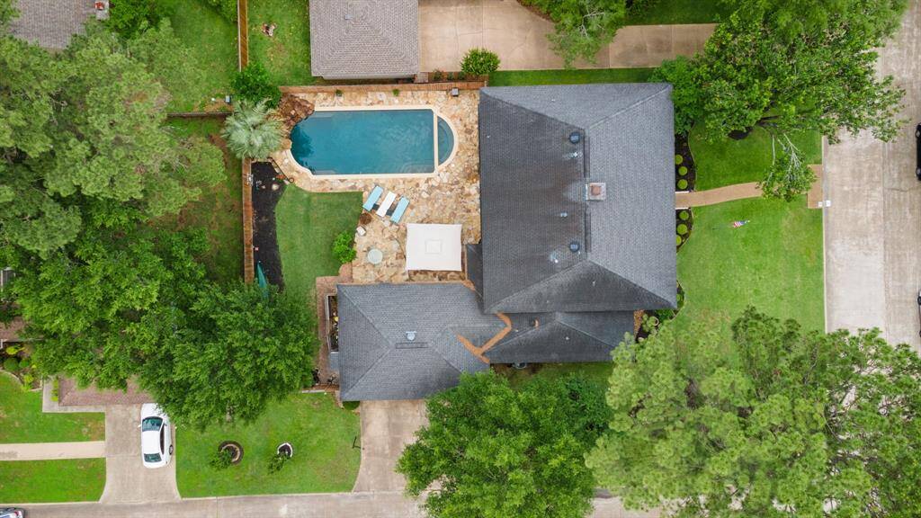 Aerial view of this incredible Lakewood Forest estate