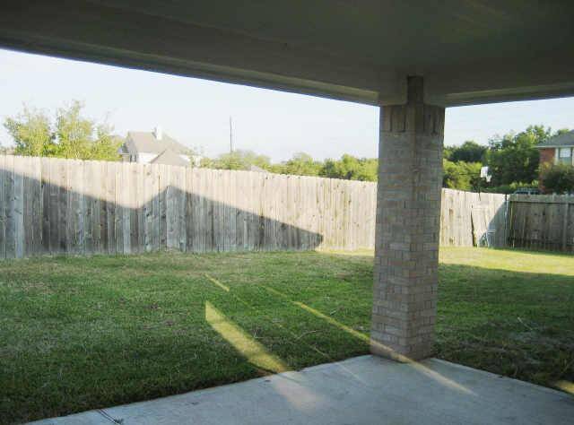 nice sized cover patio in the backyard!