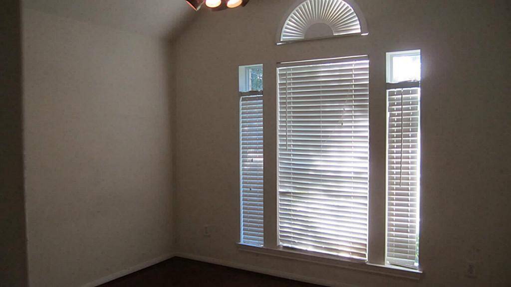 2nd room with updated floor same as master bedroom