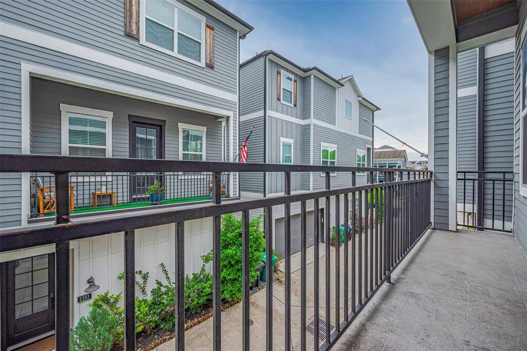 Balcony off the living area provides additional outdoor living space.