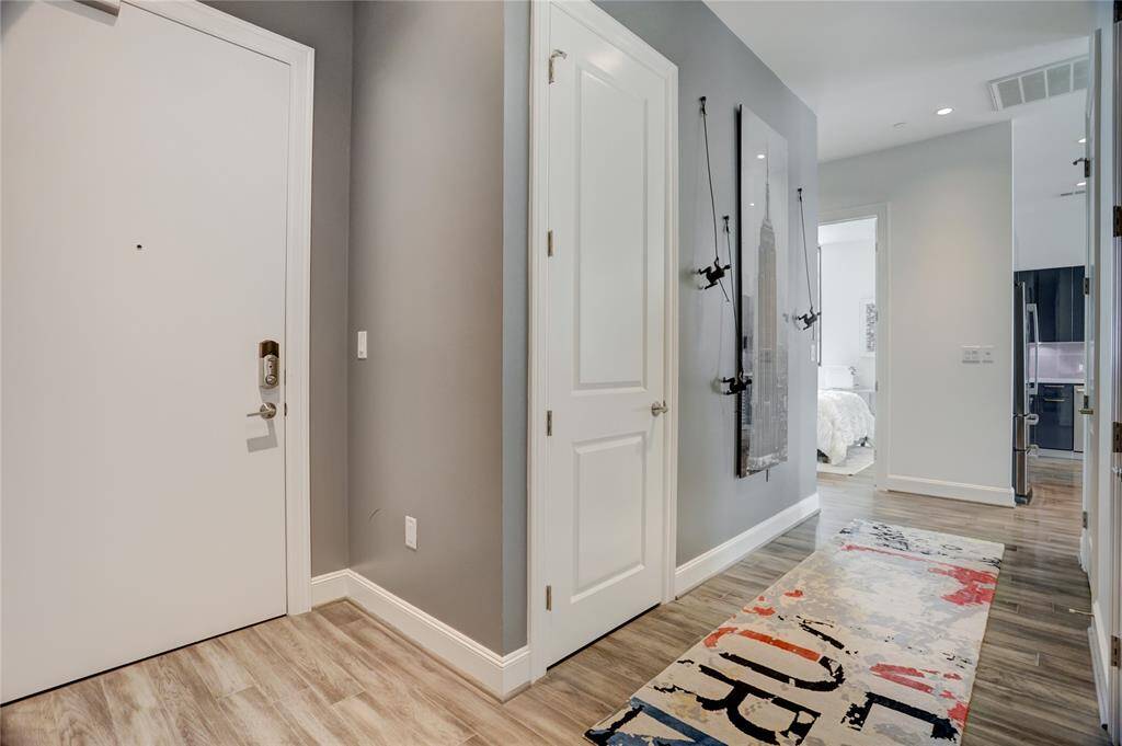 Step inside to a welcoming entryway featuring a modern look that set the tone for this stylish home. A perfect space to greet guests with warmth and character.