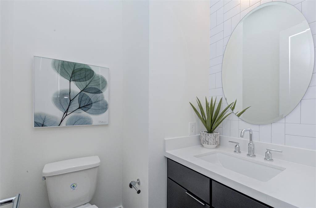 Powder room besides the living area in second story. Ideal layout so the guests do not have to get in the bedroom to use the bathroom.
