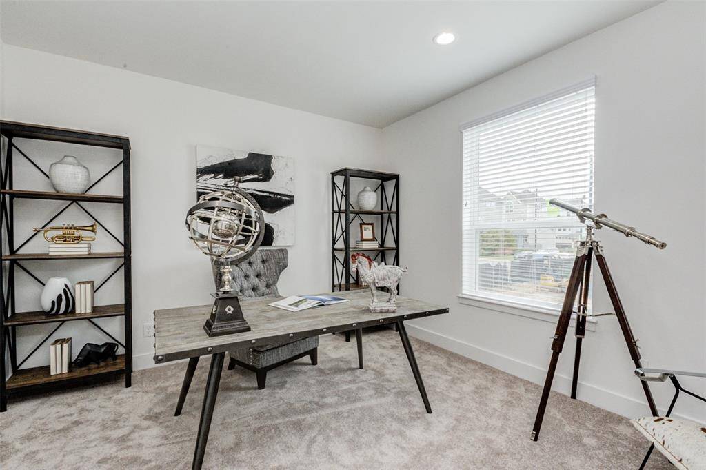 The bedroom used as an office space