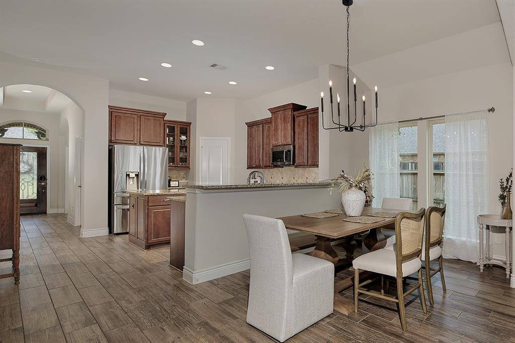 An easy flow from kitchen to dining to living