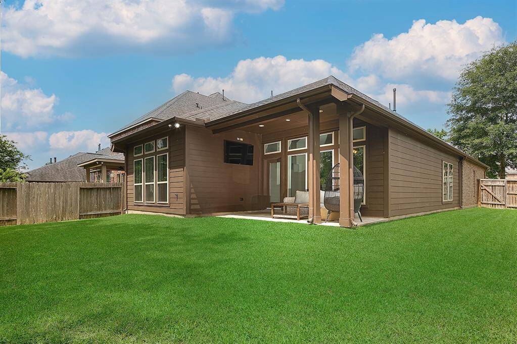 Expansive backyard and generously  sized covered porch