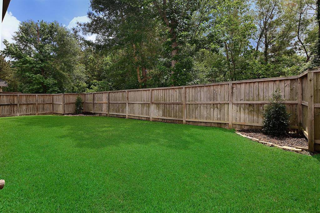 Enjoy privacy and stunning wooded views with no rear neighbors!