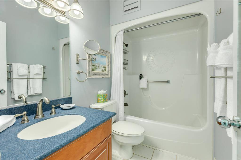 Primary bathroom has a tub/shower.
