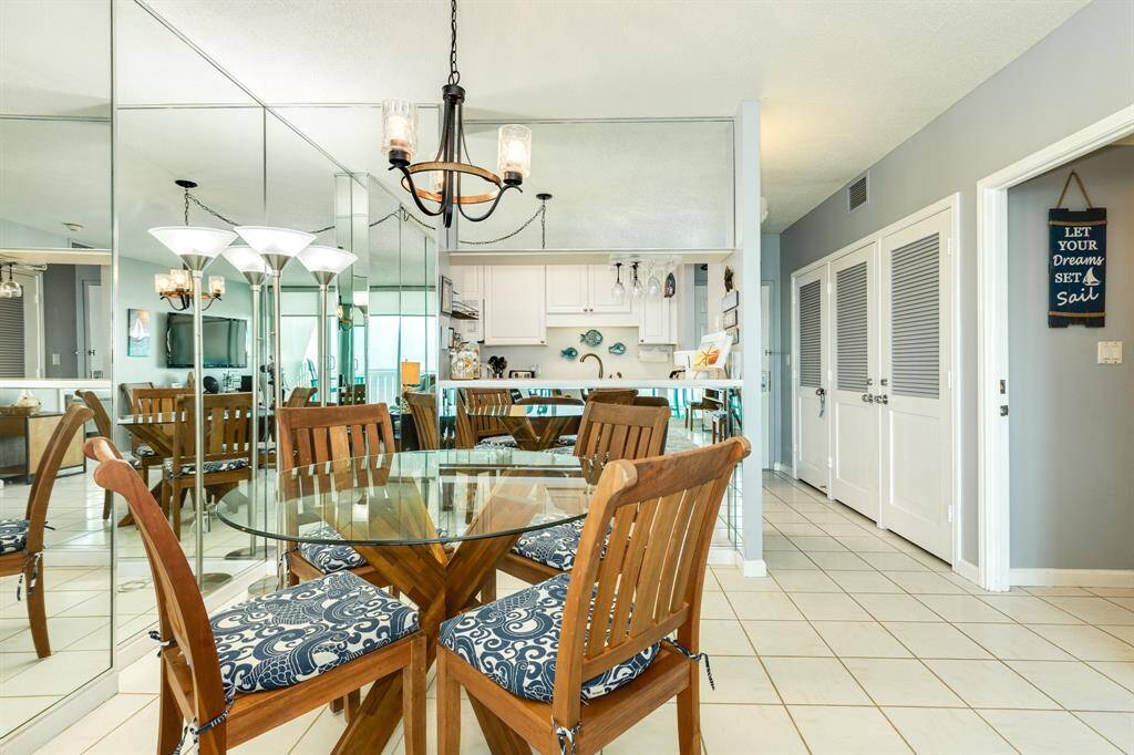 Open dining area with pass through counter to kitchen. This area is also great for setting up your home office!