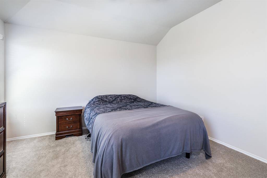 The primary bedroom has newly installed carpet.