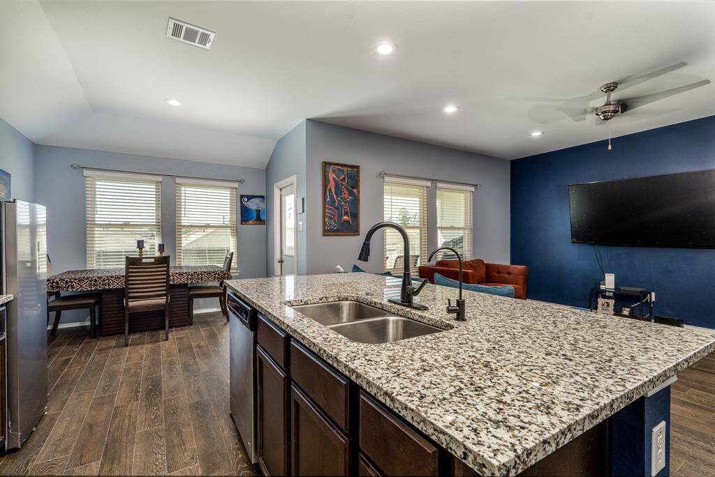 Lots of natural light through the windows that the seller installed after the home was built. The windows installed by the builder did not open but these do for those who love to let fresh air into their home.