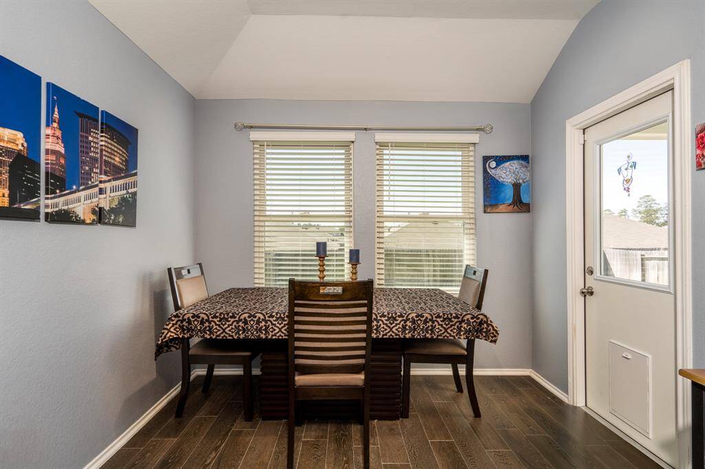 The breakfast room has a door that leads to the covered patio.