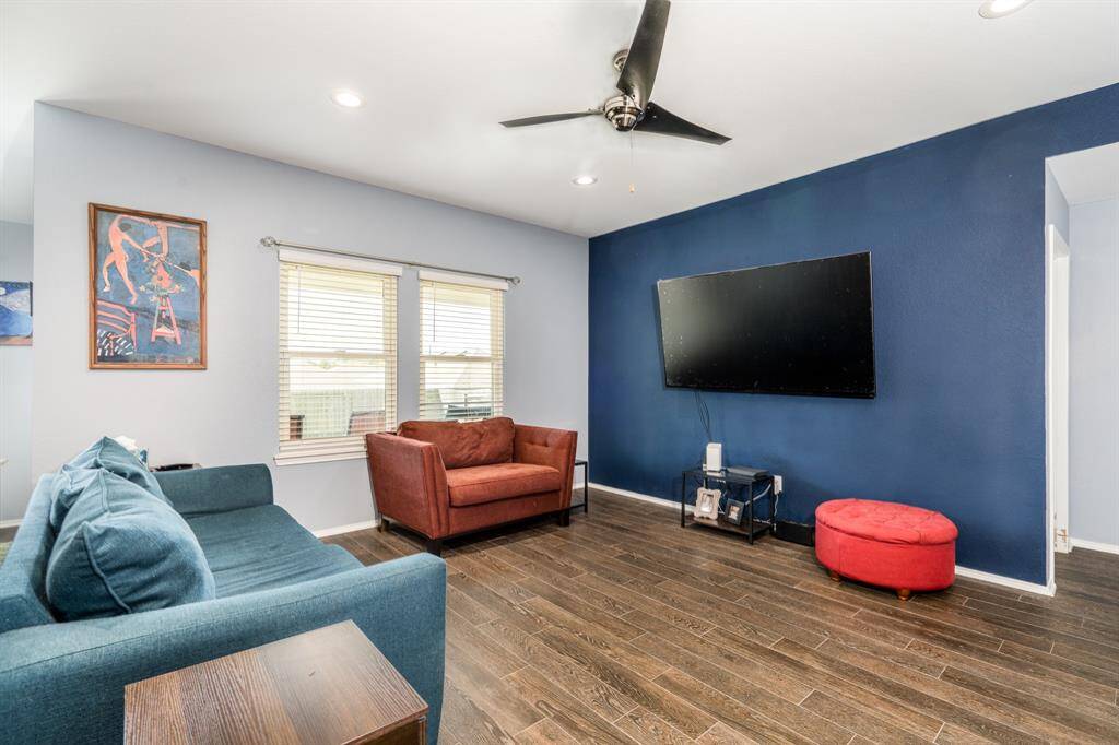 The TV in the family room conveys with the home.