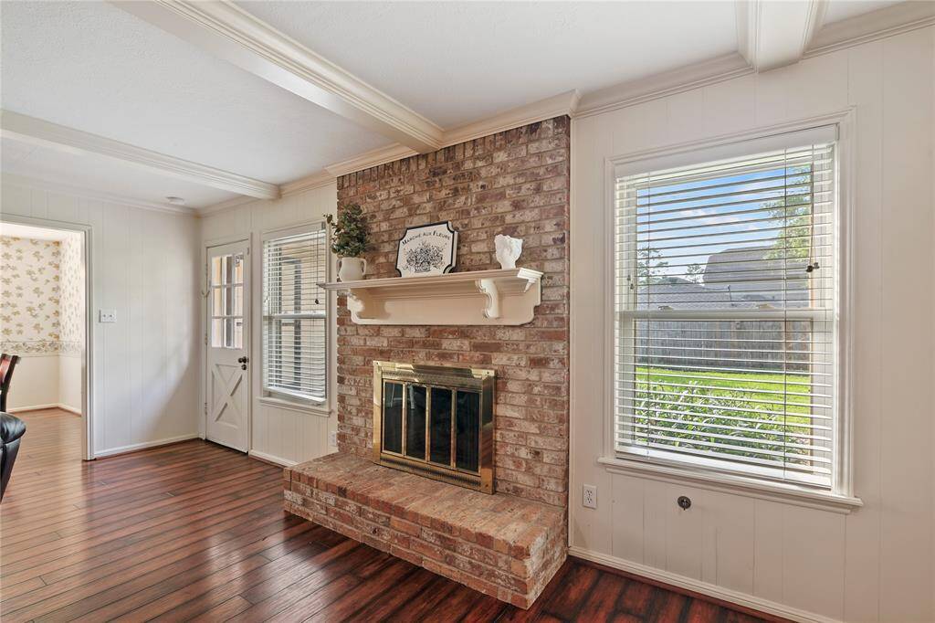 Den with Stately Fireplace