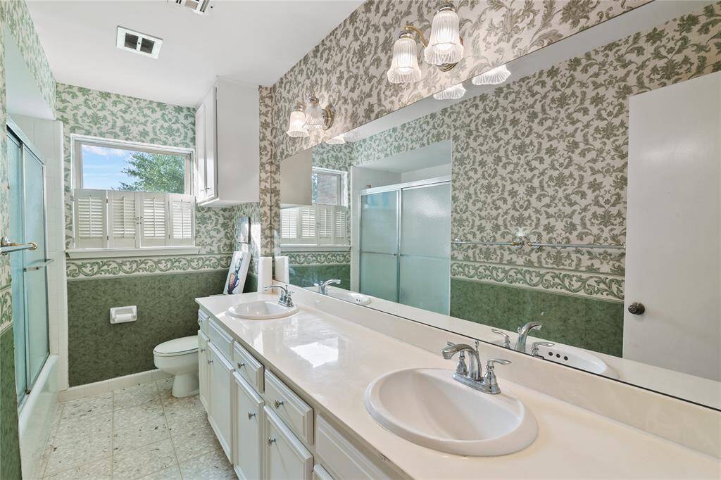Two-Sink Secondary Bathroom serves the upstairs.