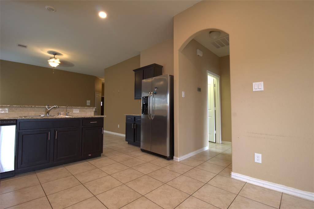 Kitchen leading to Primary Bedroom