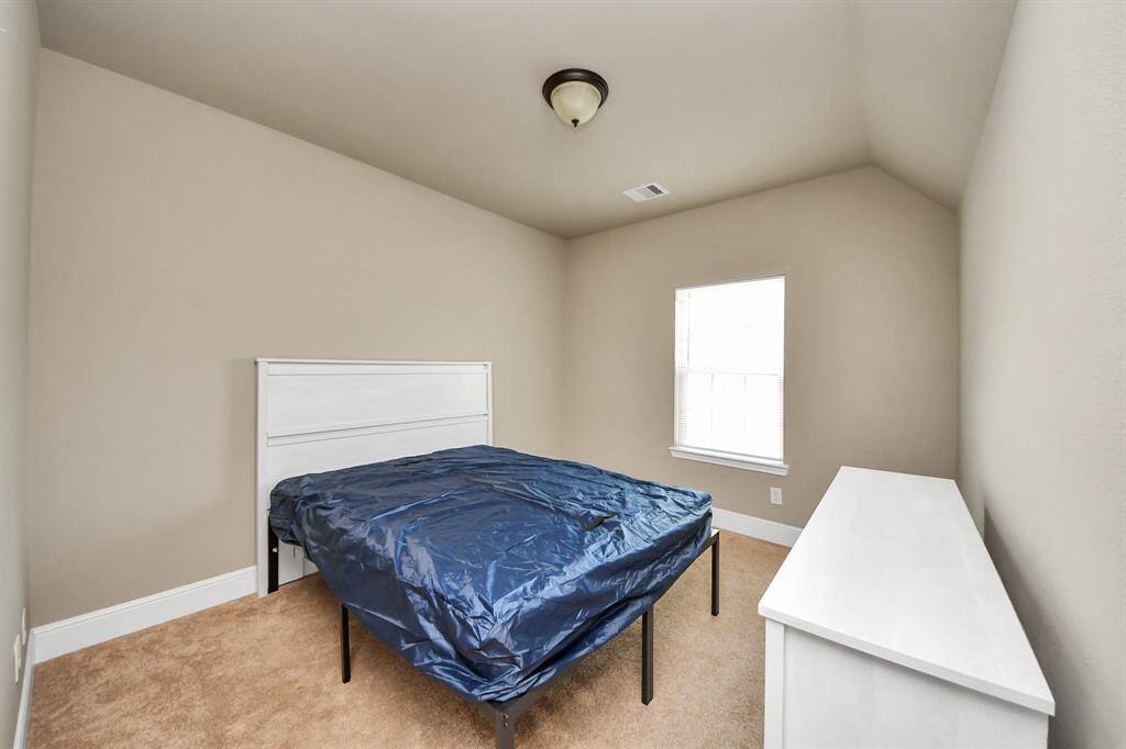 Cozy Third bedroom bedroom.