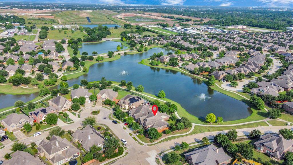 Picturesque suburban neighborhood featuring well-maintained homes with lush greenery.