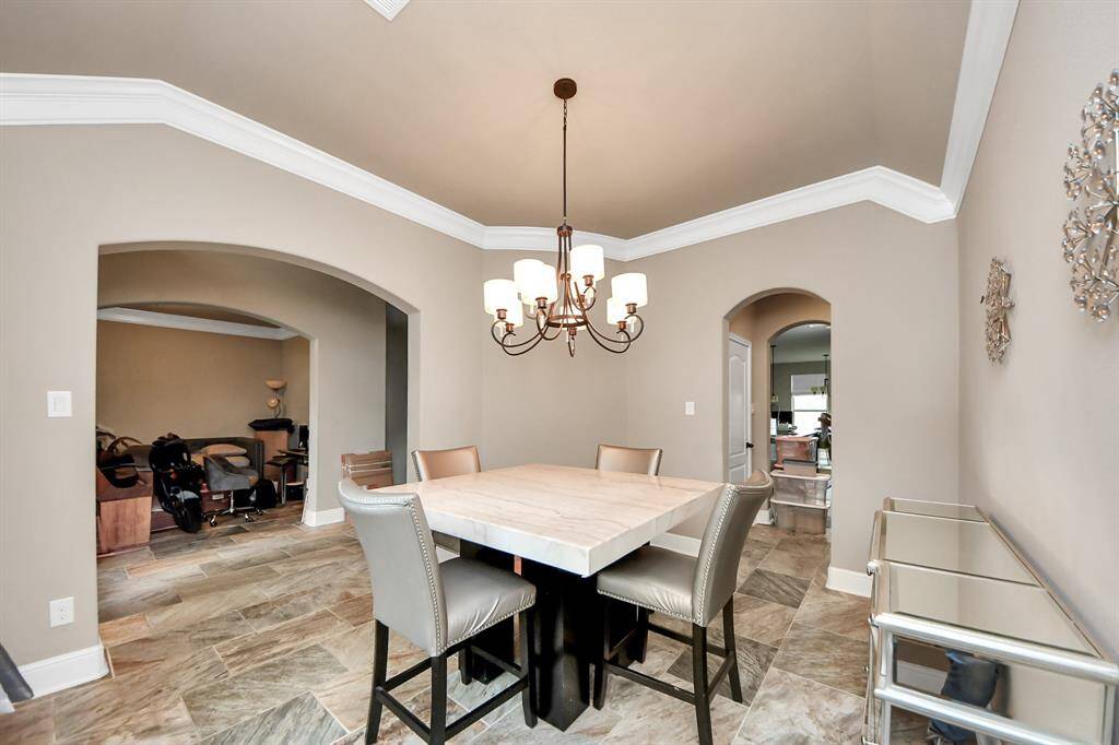 Step into this elegant dining room as you enter the home.