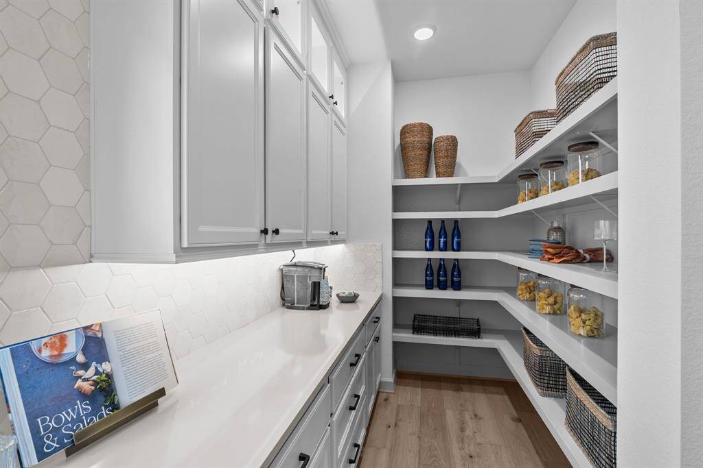 EXAMPLE PHOTO: Large Butlers pantry & pantry - great workspace where no one sees the mess!