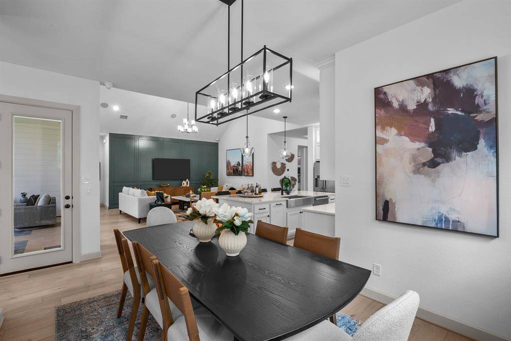 EXAMPLE PHOTO: Dining is open to the living area and convenient to your large outdoor living area