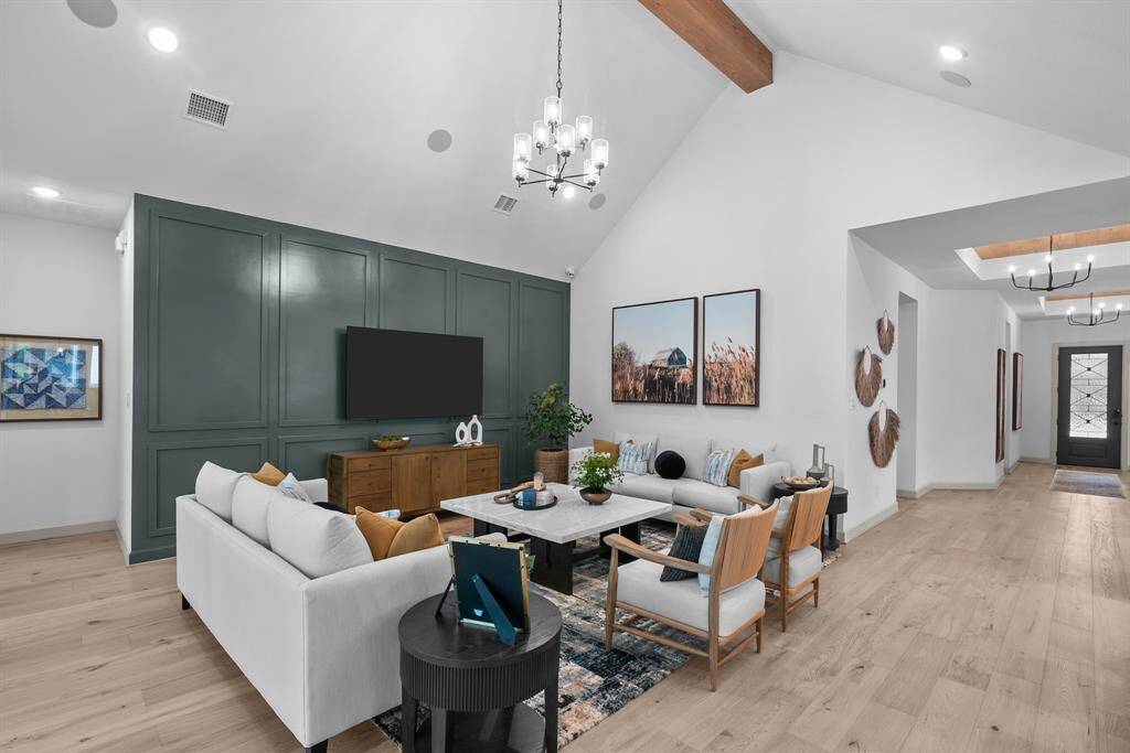EXAMPLE PHOTO:  Huge Living area with cathedral ceiling makes this a great place to hang out with friends and family!