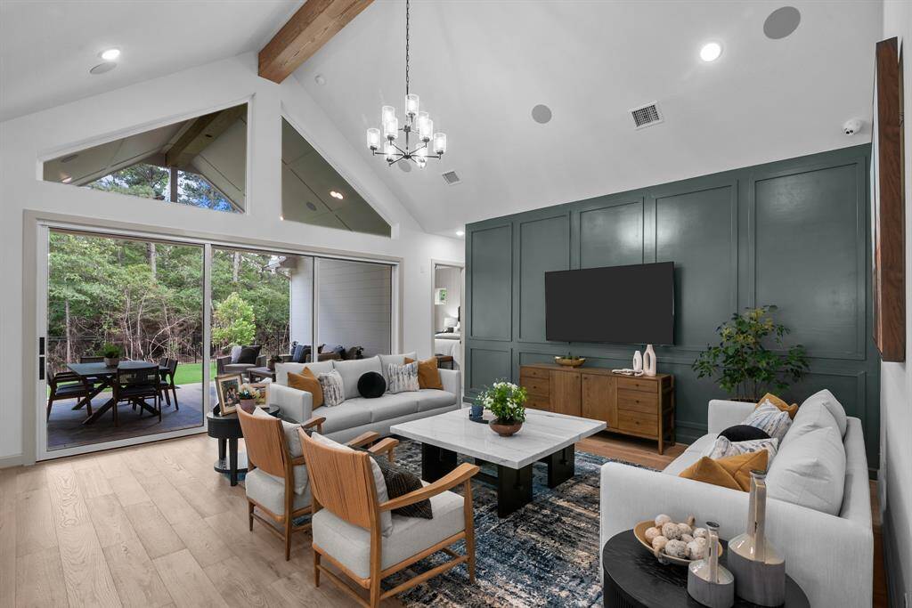 EXAMPLE PHOTO: Wow!  There's no other word for it!  This is an amazing space and the windows bring the outside in!  15 ft Stacking sliding glass doors so you can open up the entire space when needed!