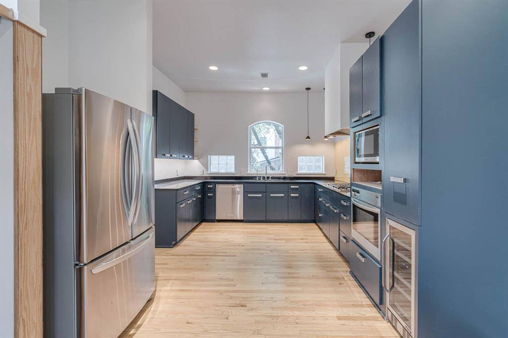 Modern kitchen featuring a gas cooktop and sleek countertops, perfect for both everyday cooking and entertaining