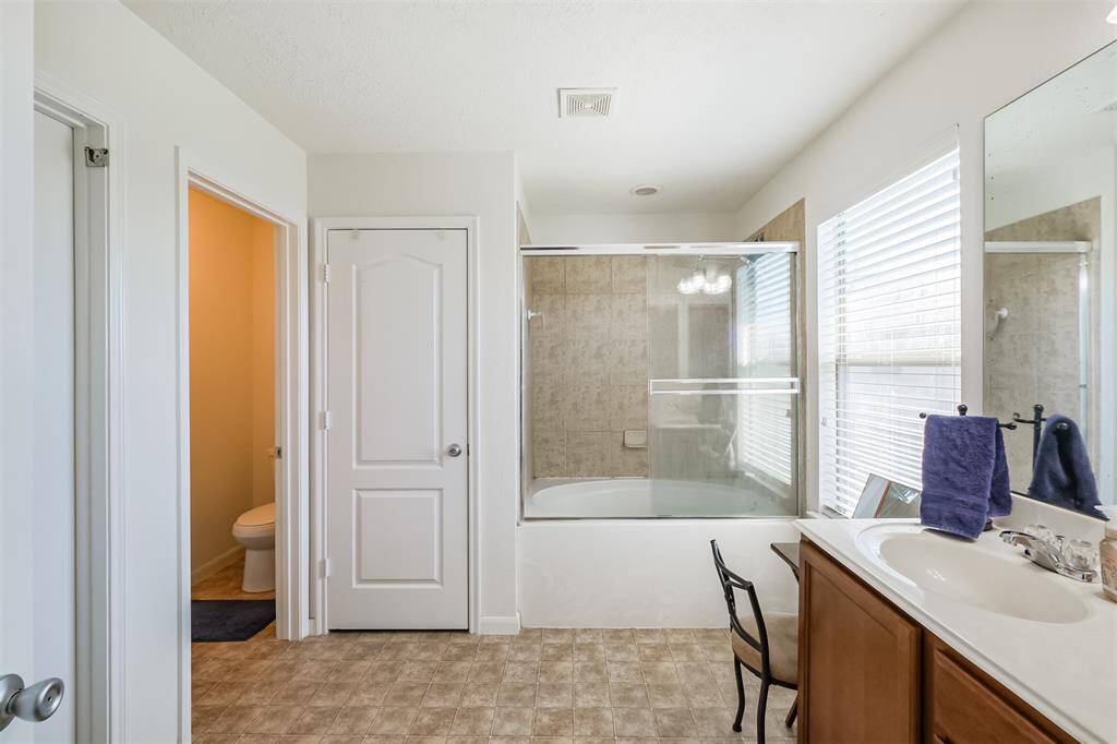 Large Soaking Tub and Glass shower doors