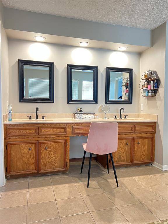 Master bathroom with dual sinks and plenty of counter space