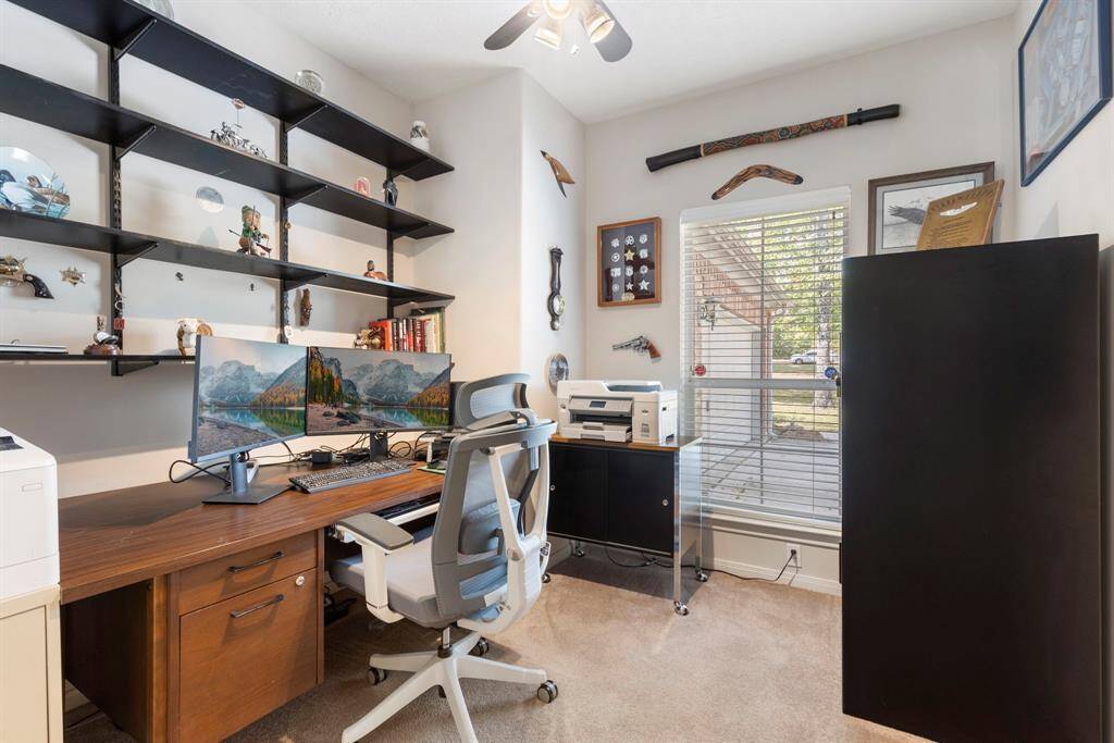Step into the perfect home office, a space thoughtfully designed to inspire productivity and focus. This well-appointed room offers a quiet and comfortable environment, ideal for remote work, study, or creative pursuits. With ample natural light and a functional layout, it provides the perfect balance of tranquility and efficiency. Whether you're conducting business or simply managing household tasks, this home office is equipped to meet all your needs